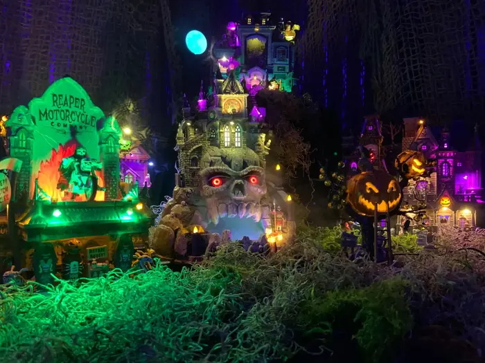 A colorful SpookyTown miniature haunted city display